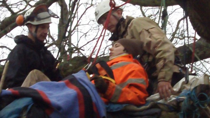 Natalie hoisted from tree-top protest spot