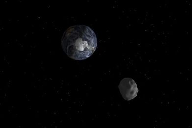 NASA computer generated image of the 2012 DA14 asteroid passing earth.