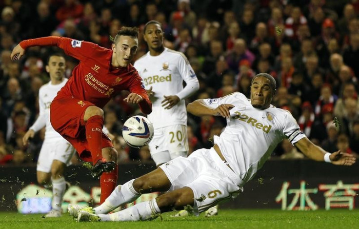 Samed Yesil and Ashley Williams (R)