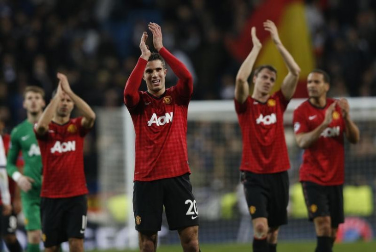 van Persie applauds the United supporters at Santiago Bernabeu