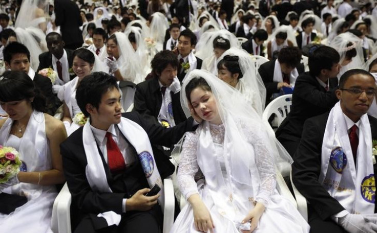 Mass Moonie Wedding in South Korea as over 3,000 couples tie the knot