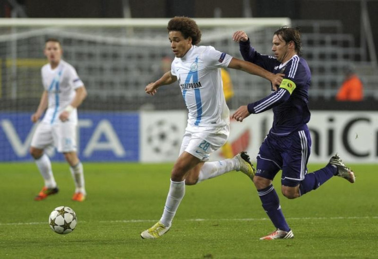 Axel Witsel and Lucas Biglia (R)