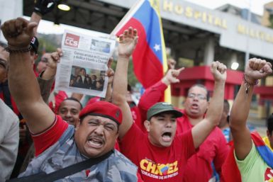 Supporters cheer Chavez's return to Venezuela
