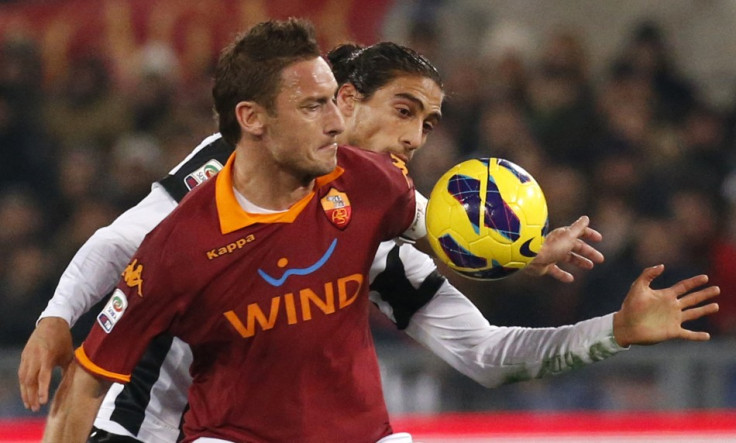 Francesco Totti and Martin Caceres
