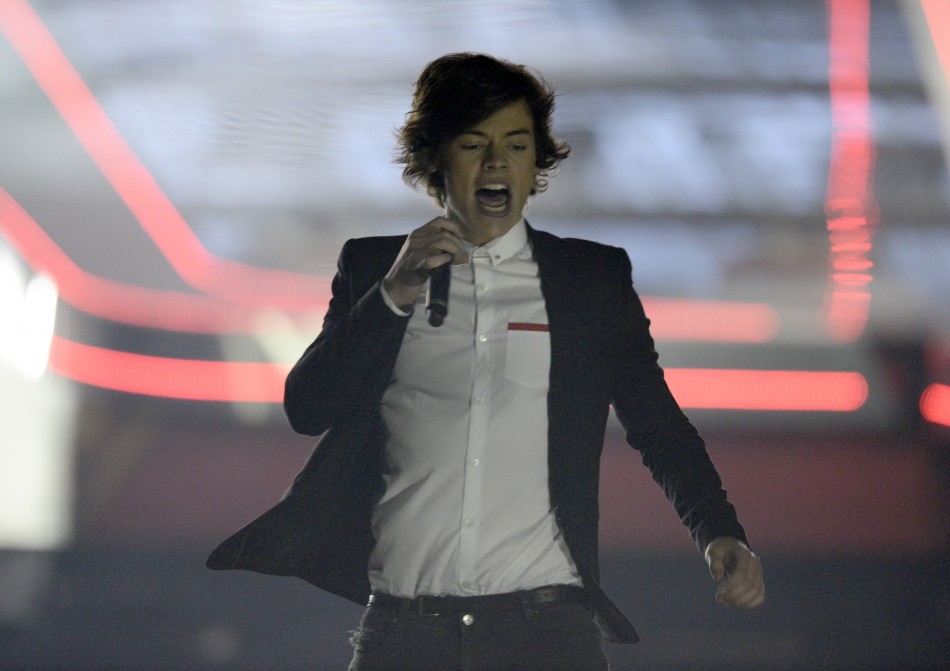 Singer Harry Styles of Pop group One Direction performs during the BRIT Awards, celebrating British pop music, at the O2 Arena in London February 20, 2013.