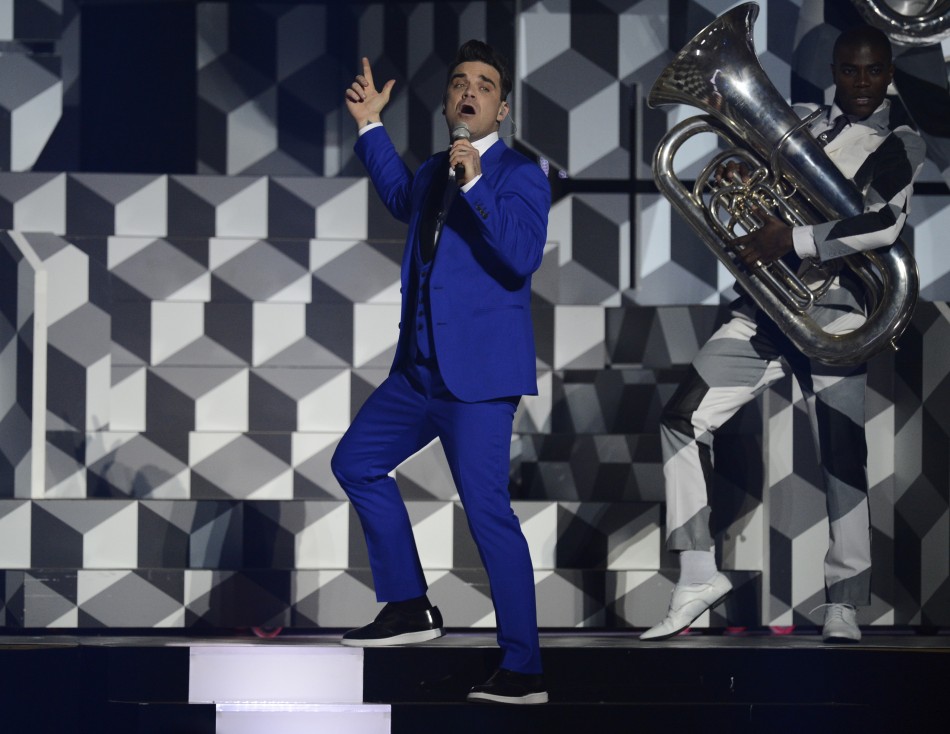 British singer Robbie Williams performs during the BRIT Awards, celebrating British pop music, at the O2 Arena in London February 20, 2013.