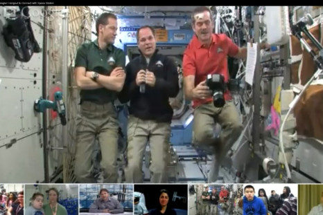 Astronauts (L to R) Marshburn, Ford and Hadfield float free aboard the International Space Station