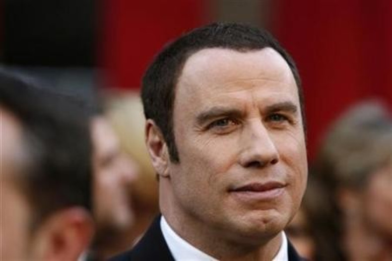 Is Oscar presenter John Travolta turning into Silvio Berlusconi?