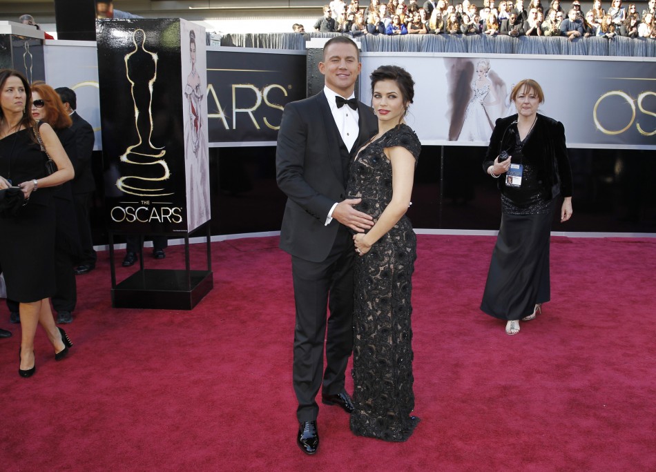 Actor Channing Tatum and wife Jenna Dewan arrive at the 85th Academy Awards in Hollywood, California, February 24, 2013.