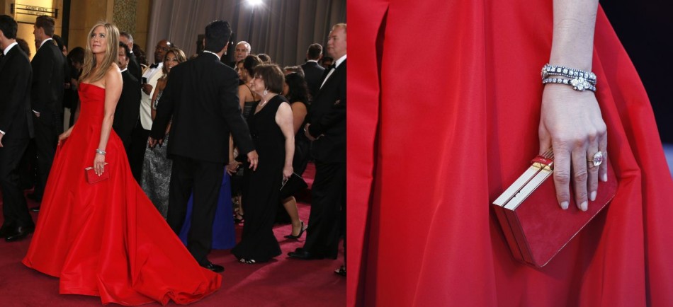 Actress and Oscars presenter Jennifer Anniston wears a red Valentino gown with Salvatore Ferragamo clutch and Fred Leighton jewels at the 85th Academy Awards in Hollywood, California February 24, 2013.