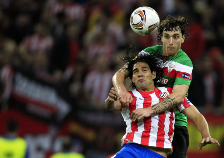 Amorebieta challenging Atletico Madrid's Falcao