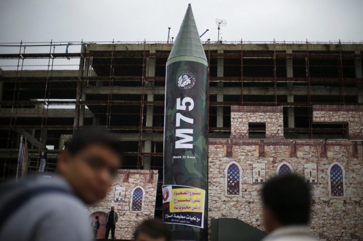 A gigantic model of a local-made M75 long range rocket is seen on stage during a preparations for Hamas rally in Gaza City December 5, 2012.