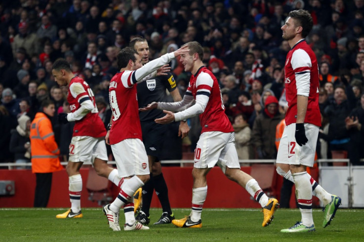 Santi Cazorla (L) and Jack Wilshere (C)