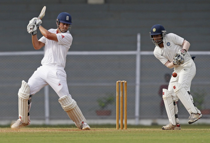 Alastair Cook (L)