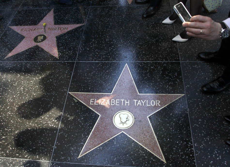 Late actor Richard Burtons star is pictured next to actress Elizabeth Taylors star after the Hollywood Walk of Fame posthumously honored the actor in Hollywood, California, March 1, 2013.