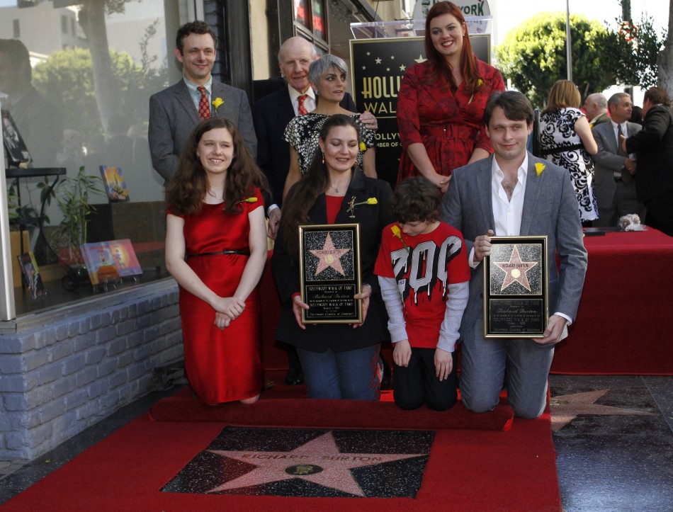 Family members and friends pose together during a ceremony posthumously honoring actor Richard Burton with a star on the Hollywood Walk of Fame in Hollywood, California, March 1, 2013.