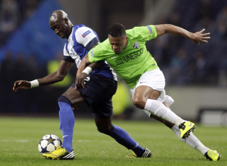 Eliaquim Mangala (R) and Julio Baptista