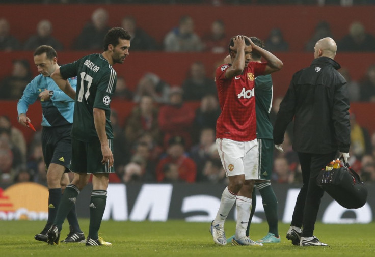 Nani reacts after being sent off as Real Madrid's Alvaro Arbeloa watches during their Champions League match (Reuters)