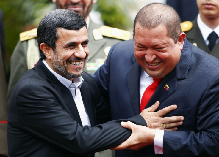 A file photo of Iran's President Mahmoud Ahmadinejad being welcomed by Venezuela's President Hugo Chavez at Miraflores Palace in Caracas - Reuters