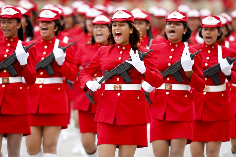 Venezuelan soldiers march during a military parade to commemorate the 20th anniversary of the failed coup attempt on President Hugo Chavez in Caracas February 4, 2012