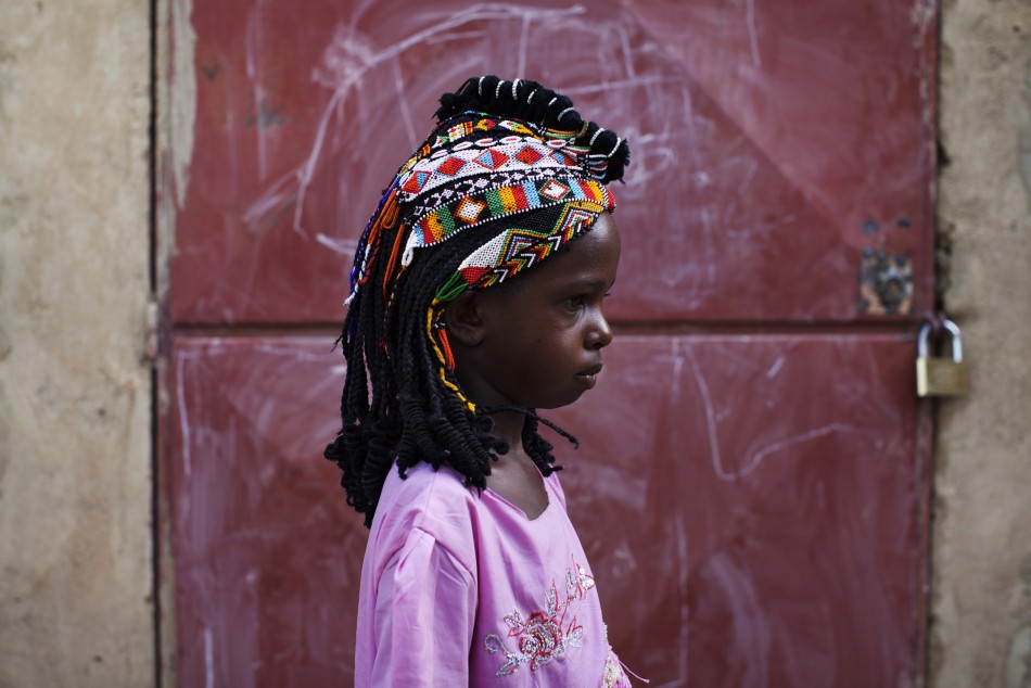 Aminata Toure in Traditional Songhai Headdress Source - ReutersJoe Penney