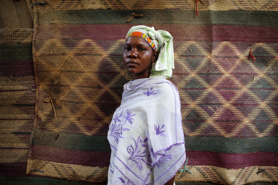 Fady Diarra in Traditional Songhai Beaded Head Wrap Source - ReutersJoe Penney