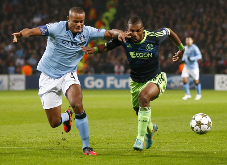 Vincent Kompany (L)