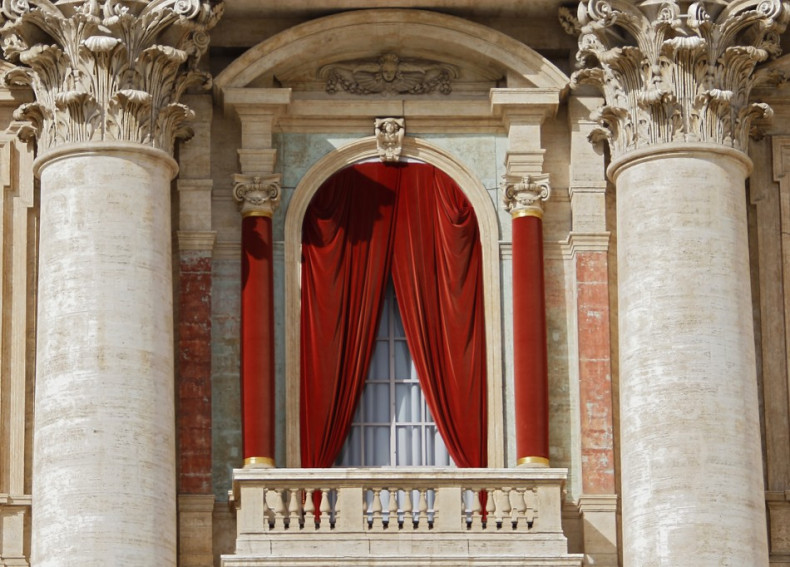 The red curtain on the central balcony, called the Loggia of the Blessings of Saint Peter's Basilica, where the new pope will appear after being elected in the conclave is seen at the Vatican