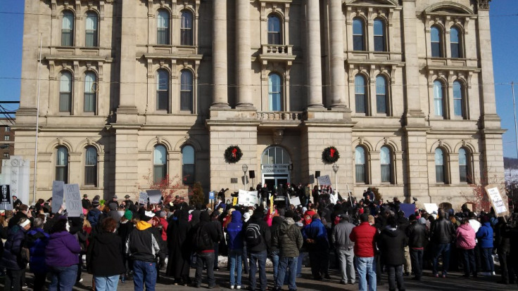 Protesters gathered to demonstrate against the handling of the case in front of the of the Jefferson County Courthouse (Reuters)