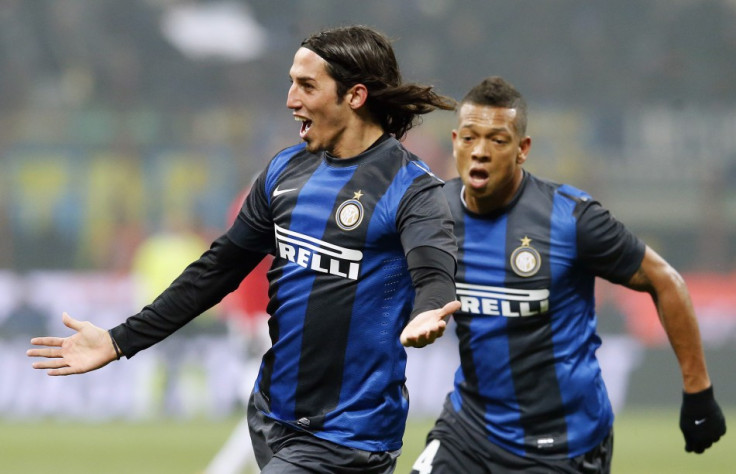 Ezequiel Schelotto (L)