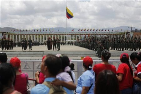 Military cadets practise a drill for Friday's parade to honour Venezuela's late President Hugo Chavez, at the military academy in Caracas March 14, 2013.