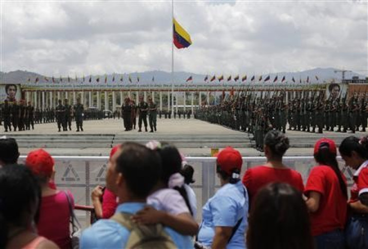Military cadets practise a drill for Friday's parade to honour Venezuela's late President Hugo Chavez, at the military academy in Caracas March 14, 2013.