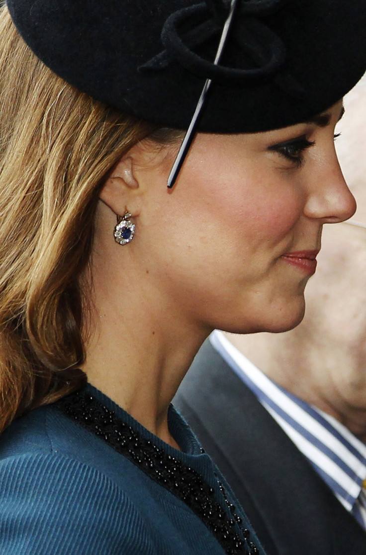 The Duchess of Cambridge wore a short teal Malene Birger coat and black hat