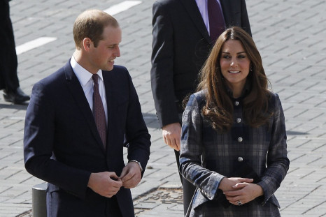 Britain's Prince William and his wife Catherine, Duchess of Cambridge arrive for their visit to the Emirates Arena in Glasgow, Scotland April 4, 2013