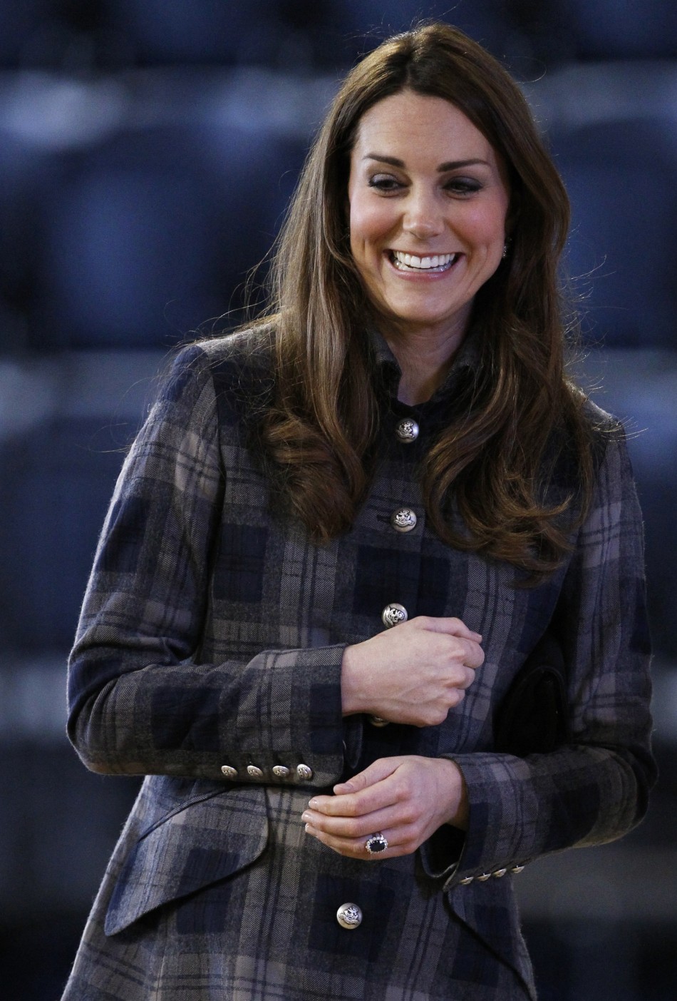 Britains Catherine, Duchess of Cambridge smiles during her visit to the Emirates Arena in Glasgow, Scotland April 4, 2013.