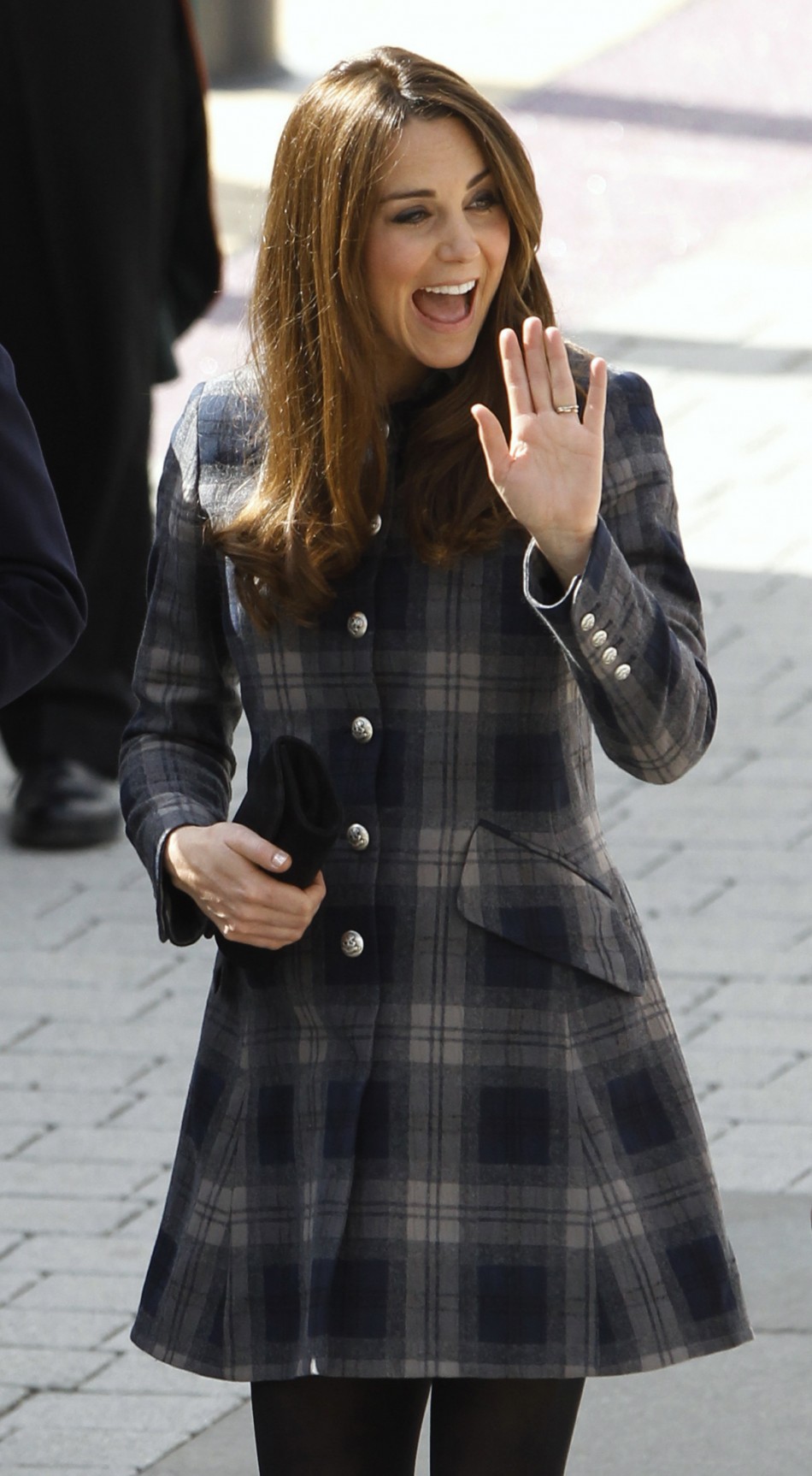 Britains Catherine, Duchess of Cambridge waves as she arrive for a visit to the Emirates Arena in Glasgow, Scotland April 4, 2013.
