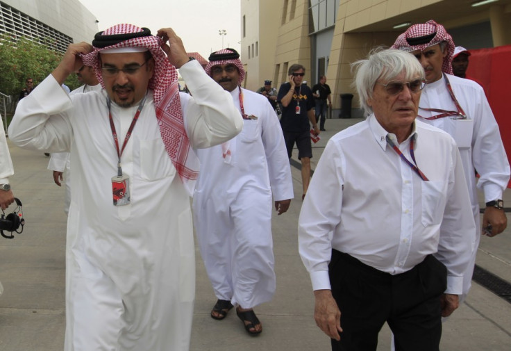 Bernie Ecclestone (R)