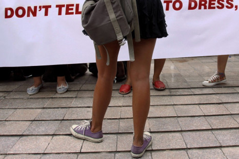 A woman wearing a miniskirt takes part in a protest against the idea that provocatively dressed women are to blame for sexual assaults, in Jakarta September 18, 2011.