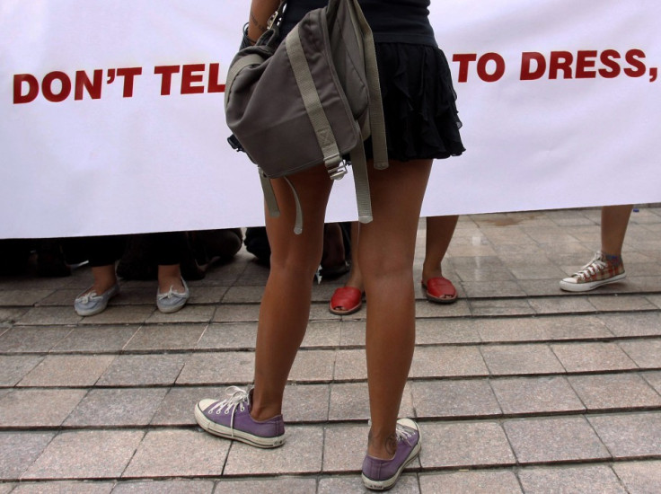 A woman wearing a miniskirt takes part in a protest against the idea that provocatively dressed women are to blame for sexual assaults, in Jakarta September 18, 2011.