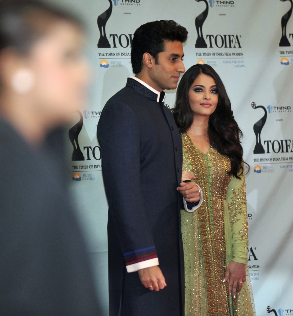 Actor Abhishek Bachchan and wife actress Aishwarya Rai arrive for the inaugural Times of India Film Awards in Vancouver, British Columbia April 6, 2013.