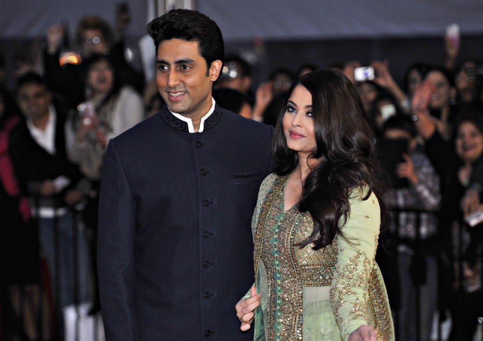 Actor Abhishek Bachchan and wife actress Aishwarya Rai arrive for the inaugural Times of India Film Awards in Vancouver, British Columbia April 6, 2013.