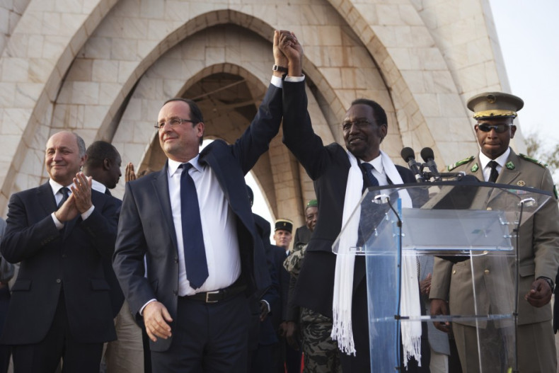Victory: President Hollande with Mali's interim president Dioncounda Traore