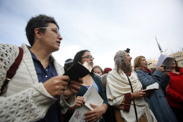 Members of "Women of the Wall" group pray at the Western Wall in Jerusalem's Old City