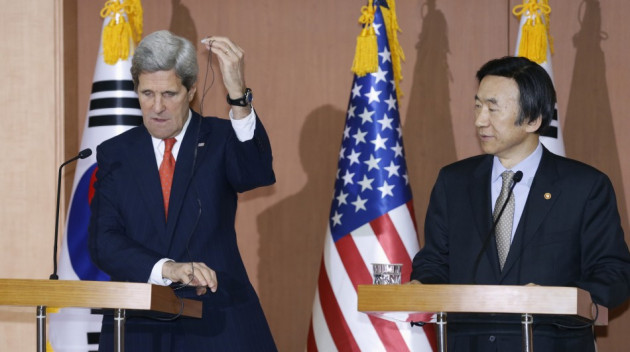 U.S. Secretary of State John Kerry (L) adjusts an earphone during a news conference with South Korean Foreign Minister Yun Byung-se U.S. Secretary of State John Kerry (L) adjusts an earphone during a news conference with South Korean Foreign Minister Yun Byung-se