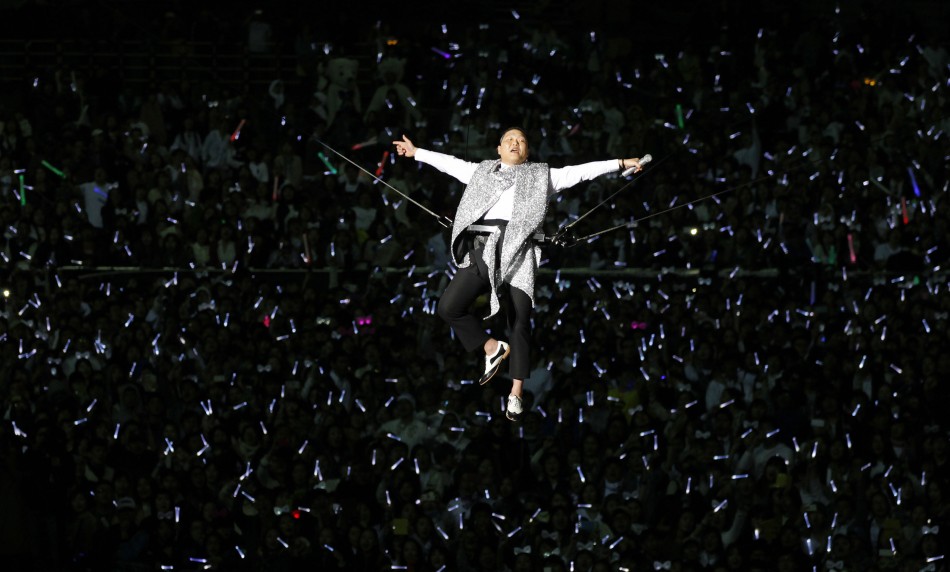 South Korean rapper Psy performs during his concert Happening in Seoul April 13, 2013. Psy performed his new song Gentleman in public for the first time on Saturday at the concert at Seouls World Cup stadium.