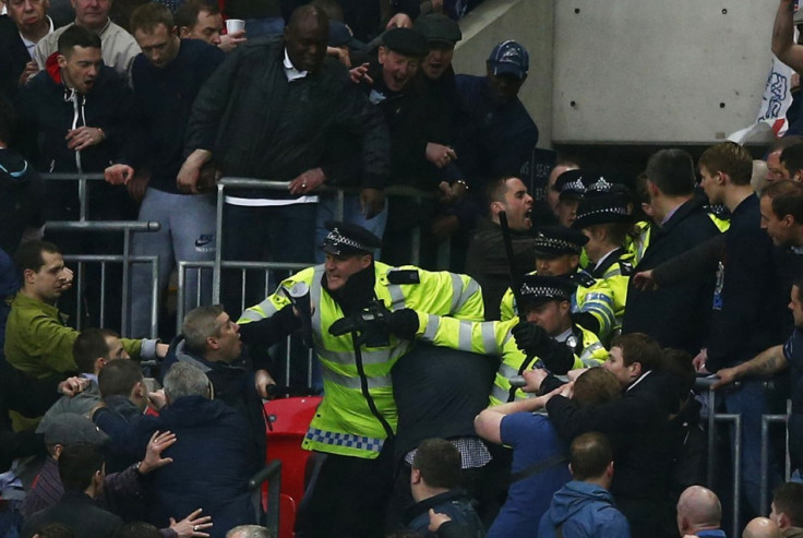 Millwall fans clash with police at Wembley