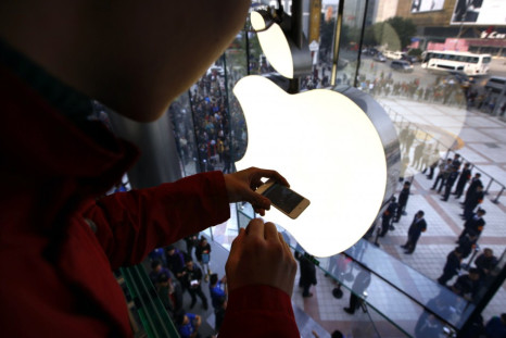 Apple share price drops below $400