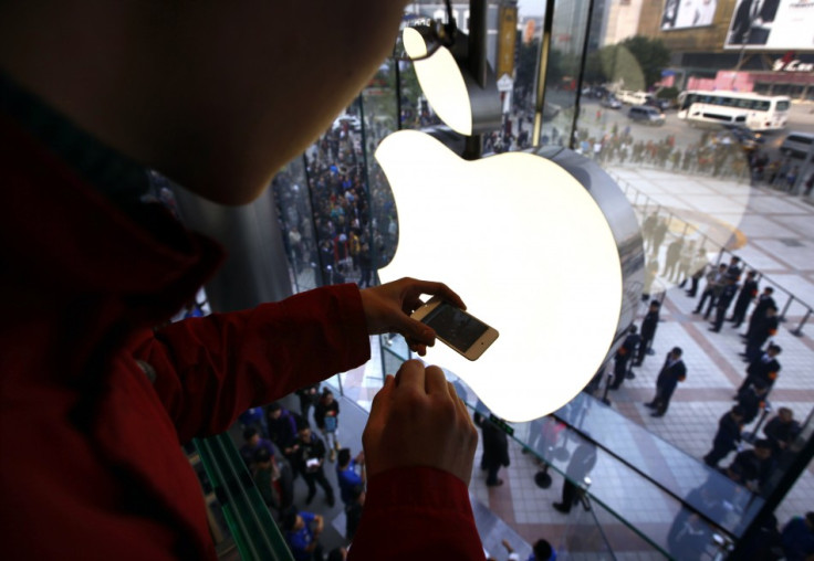 Apple share price drops below $400