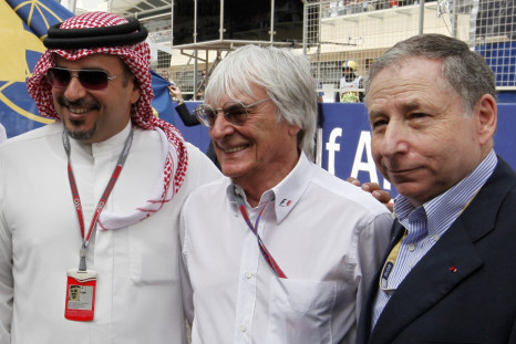 Formula One commercial supremo Bernie Ecclestone (C) poses with Crown Prince Sheikh Salman bin Hamad al-Khalifa (L) and FIA President Jean Todt before the Bahrain F1 Grand Prix