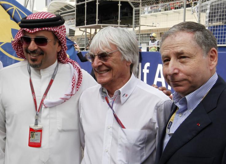 Formula One commercial supremo Bernie Ecclestone (C) poses with Crown Prince Sheikh Salman bin Hamad al-Khalifa (L) and FIA President Jean Todt before the Bahrain F1 Grand Prix